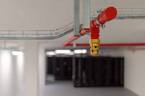 Commercial printer employee follows GMG EnviroSafe's tailored EHS solutions for safety