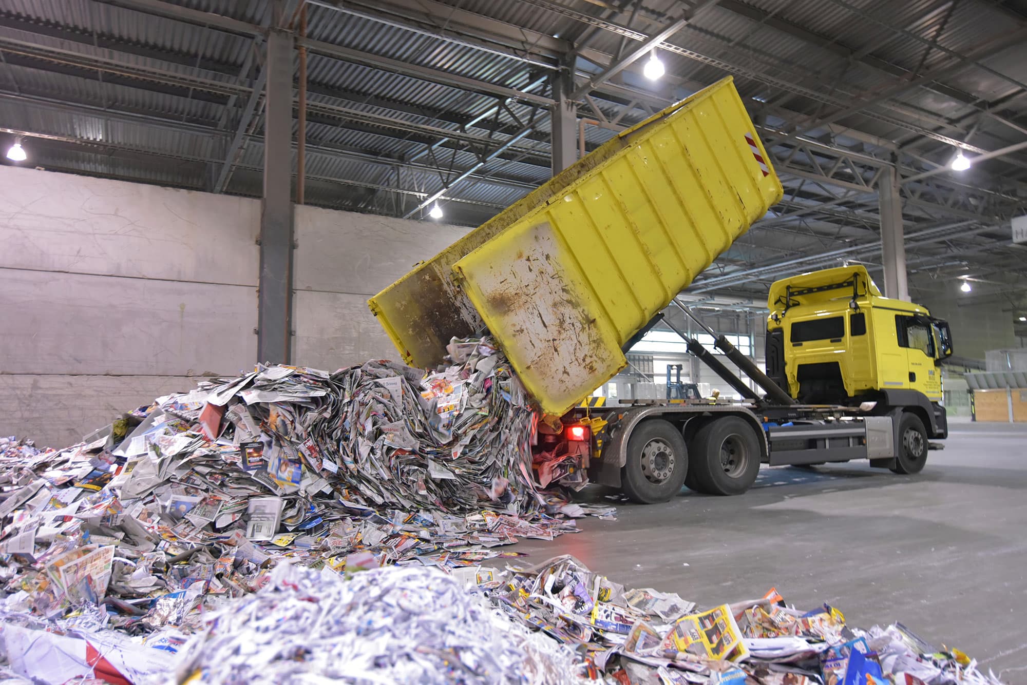 Commercial printer employee follows GMG EnviroSafe's tailored EHS solutions for safety