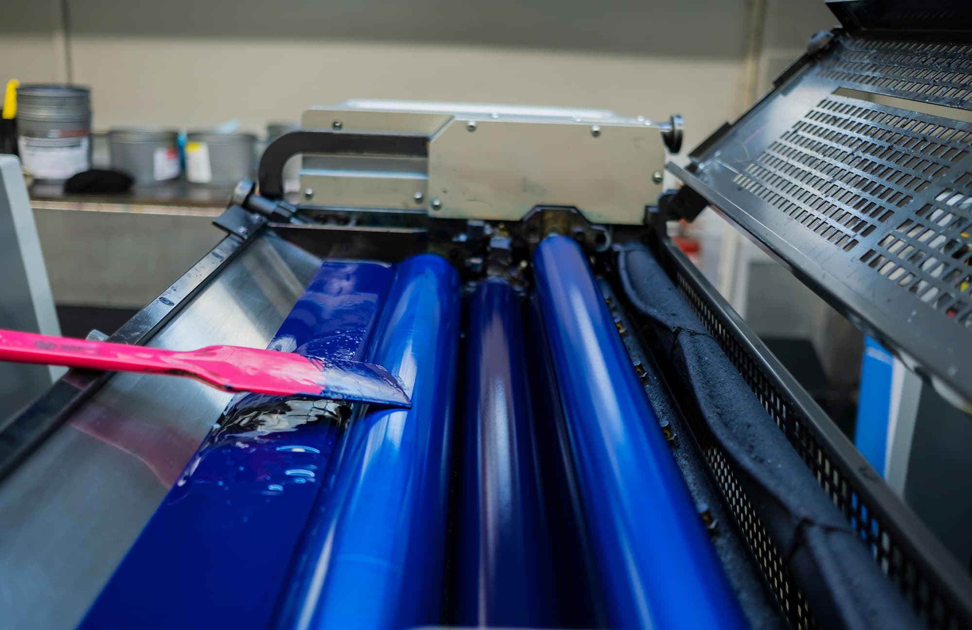 Commercial printer employee follows GMG EnviroSafe's tailored EHS solutions for safety