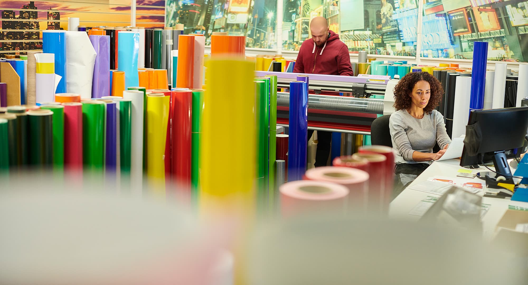 Commercial printer employee follows GMG EnviroSafe's tailored EHS solutions for safety